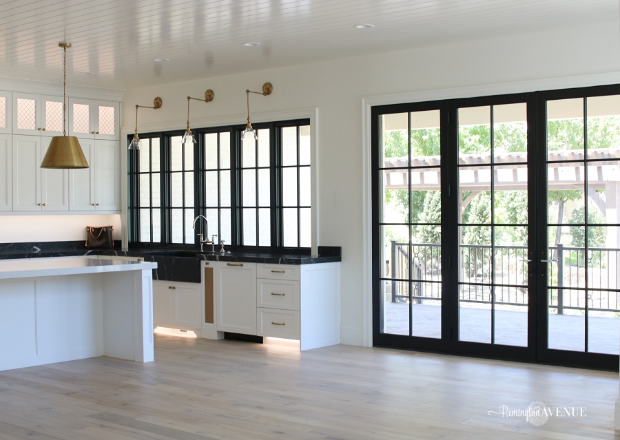 French Country Modern Kitchen with Black Marble Counters