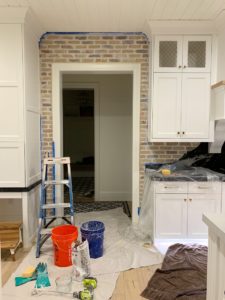 Diy Brick Backsplash with German Schmear